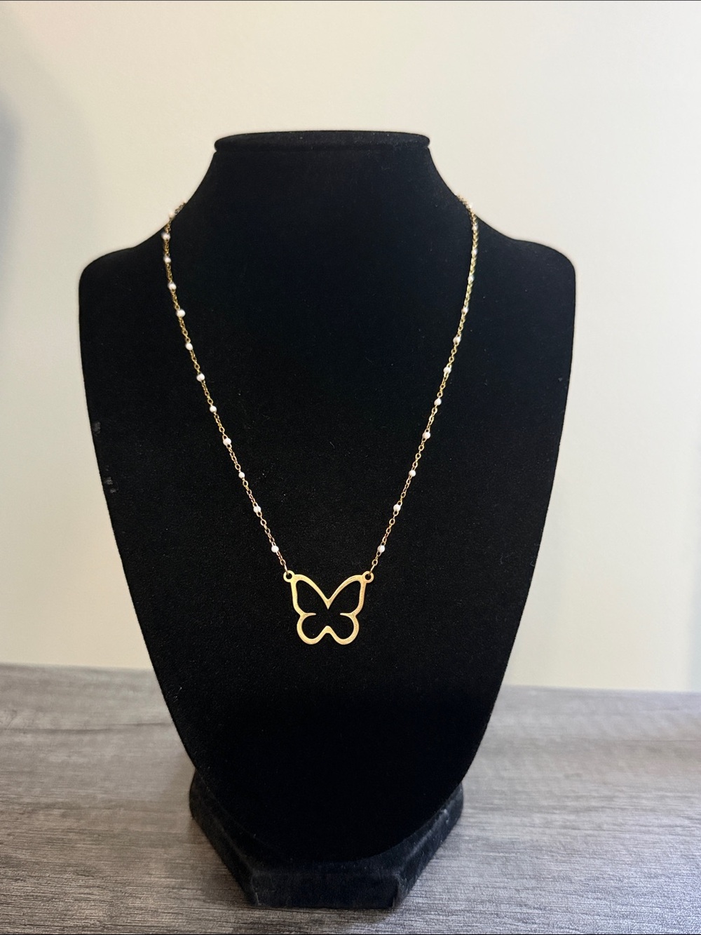 Gold plated stainless steel butterfly necklace with white and gold chain
